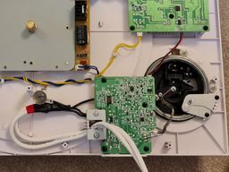 Internal view of turntable showing tonearm PCB.